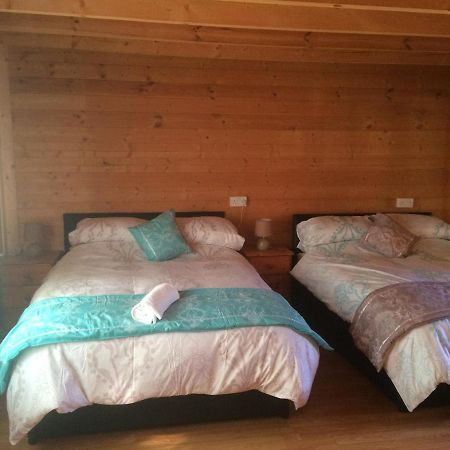 Log House Hideaway Villa Johnswell ภายนอก รูปภาพ